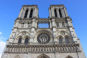 Fototapeta na wymiar Notre Dame Cathedral from the outside. Notre Dame in perfect shape before the fire. Notre Dame on a beautiful sunny day 
