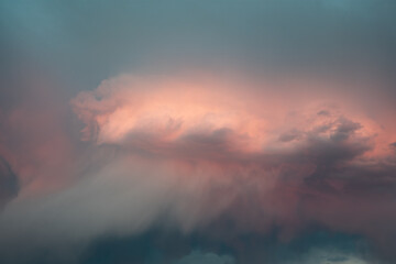 Dramatic pink summer storm clouds