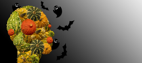 Head of a person made of decorative and halloween pumpkins with ghosts and bats around. Halloween...