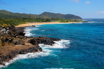 Sandy beach on the eastern coast of O'ahu island in Hawaii along the Kalaniana'ole Highway - obrazy, fototapety, plakaty