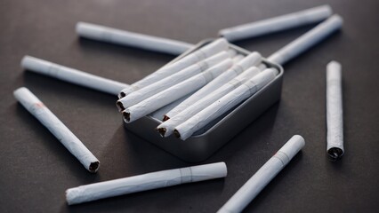 Many cigarettes stack on the table, a box of cigarettes. Unhealthy lifestyle concept and Drugs are harmful to the respiratory system.