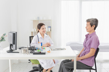 asian doctor and patient talk about history information in mental health clinic, she screening and diagnosis about symptoms of patient, healthcare process in hospital
