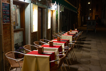 Table settings at night in Venice, Italy