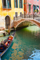 Fototapeta na wymiar A canal bridge in Venice, Italy
