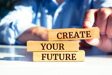 Wooden blocks with words 'Create Your Future'.