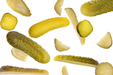 Tasty pickled cucumbers falling on white background