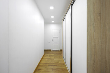 White interior door with sliding wardrobe