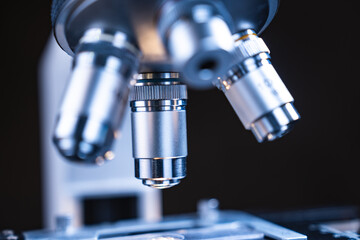 professional scientific equipment microscope for medicine scientist using in biotechnology science laboratory, biology or chemistry and medical technology research with microbiology experiment
