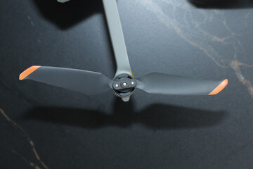 Gray and orange drone propellers © Watchara