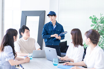 Business person having a meeting with an engineer