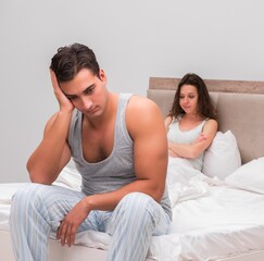 Family conflict with wife and husband in bed