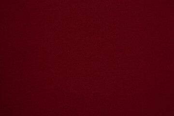 Close up of Dark red colour cotton fabric tartare background