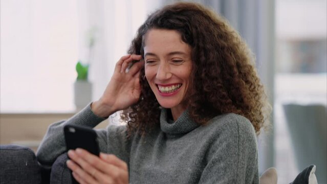Talking Brazilian woman, phone and video call in house living room or relax home sofa in lockdown. Happy smile, laughing or comic person with communication mobile technology for social media app chat