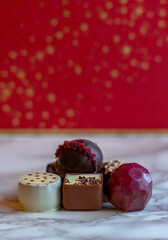 Holiday chocolate for Christmas, in fancy shapes with gourmet fillings
