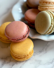 crispy meringue Macarons on a marble table