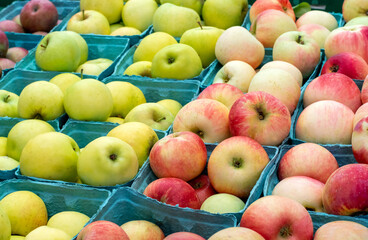 Pints of Michigan apples for sale at a road side market