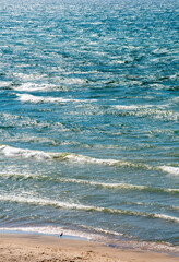 silvery waves on Lake Michigan off silver beach in Michigan USA 