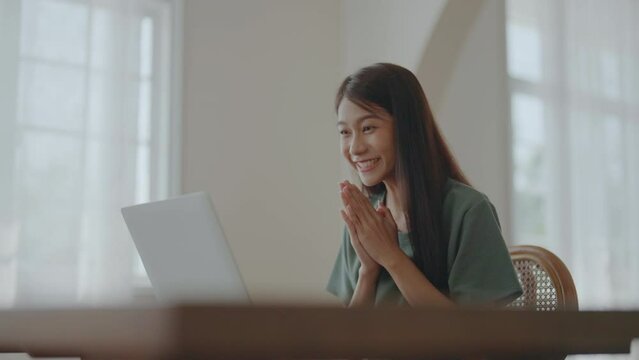 Excited asian female feeling euphoric celebrating online win success achievement result, young woman happy about good email news, motivated by great offer or new opportunity, passed exam, got a job