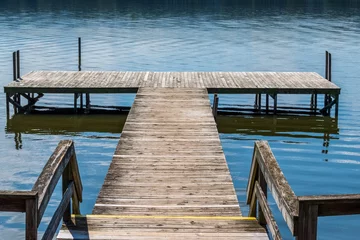 Fotobehang wooden pier on the lake © lowkei03