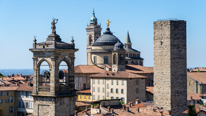 Fototapeta na wymiar Bergamo, Italy. Landscape at the towers and bell towers of the old town. One of the most beautiful cities in Italy