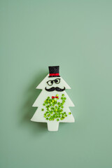 creative Christmas tree on green background