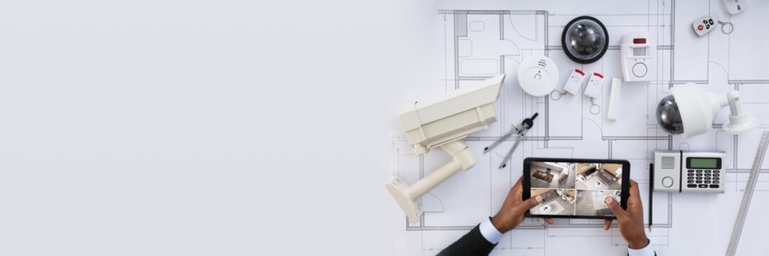 Person Watching Footage On Digital Tablet