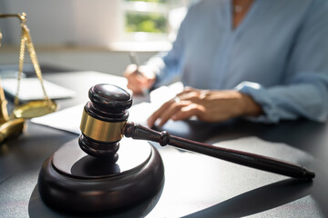 Judge With Gavel And Law Scale