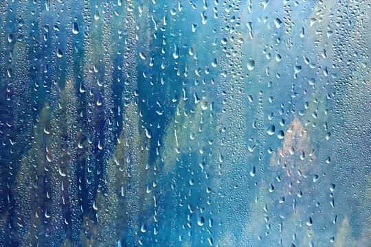 autumn view window raindrops on glass, abstract sad landscape wallpaper