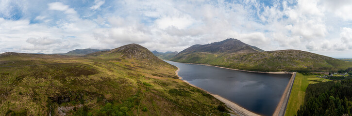Naklejka premium panorama aerial view of reservoir in the countryside of Northern Ireland during Springtime