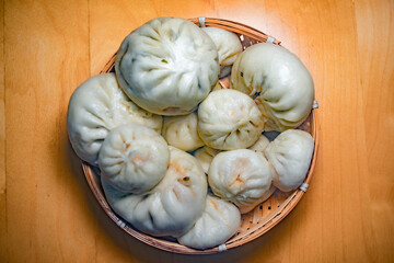 A close-up of Chinese steamed stuffed buns