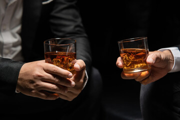 Businessmen in suits drinking  Celebrate whiskey