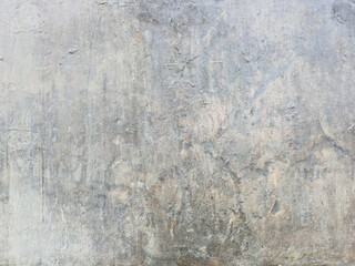 Aged wall background. rough stone texture. cracked and scratched backdrop