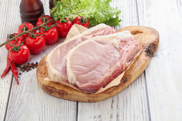 Raw pork t-bone steak for grill