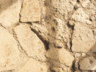 Ancient pavement stone background close up. old cobblestone backdrop
