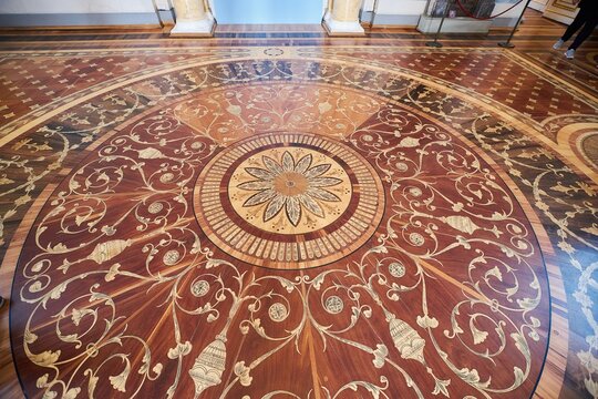 St. Petersburg, Russia - May 27, 2021: Hermitage Museum, parquet made of precious wood of fine art work. Palace interior details.