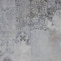Old gray grey vintage worn geometric shabby mosaic ornate patchwork motif porcelain stoneware tiles stone concrete cement wall texture background square pattern - 534674708