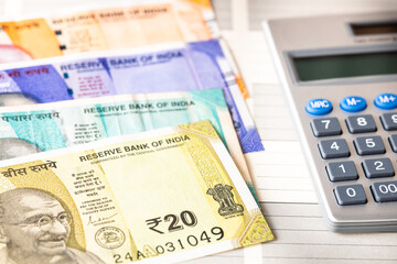 Financial and tax settlements, Indian money and calculator