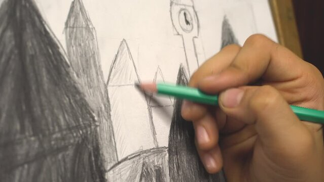 Closeup graphite pencil drawing line on white paper. Macro of architect writing sketch plan on blueprint. Unrecognizable architectural designer making construction plan, slow motion