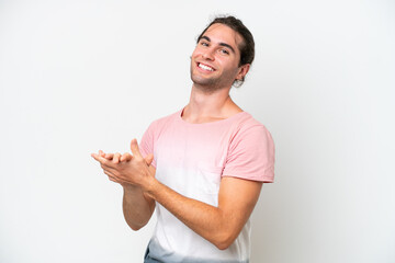 Caucasian handsome man isolated on white background applauding