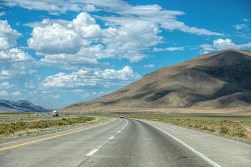 Naklejka premium Road in an arid landscape in the USA