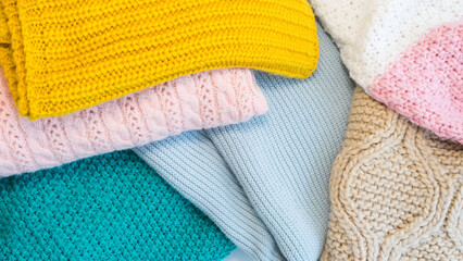 Top view of multi-colored, multi-texture knitted things