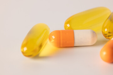 Tablets, medications on a white background, a scattering of tablets