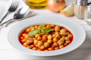 Traditional delicious Turkish foods; Turkish Food Chickpeas with Meat. Turkish name; Etli nohut