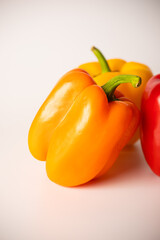 Bulgarian pepper of different colors on a white background