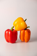 Bulgarian pepper of different colors on a white background