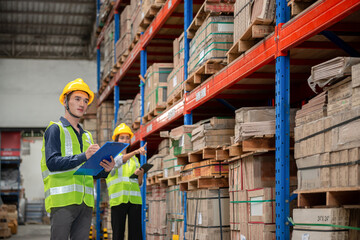 Warehouse worker working together in warehouse