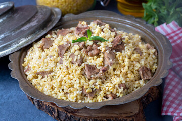 From traditional delicious Turkish cuisine; Bulgur pilaf with meat (Turkish name; etli bulgur pilavi)