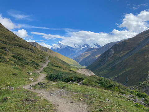 Trekking trail landscape in the mountains of Nepal