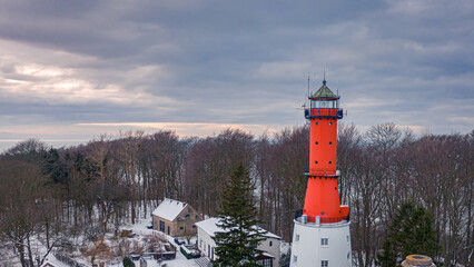 Winter lighthouse at Baltic Sea. Aerial view of winter, Poland