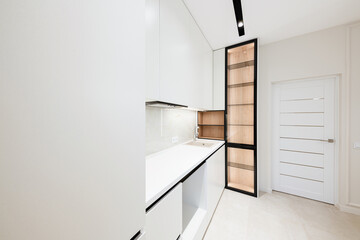 bright white kitchen in a new home interior design